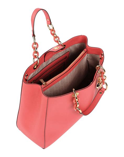 michael kors coral purse.